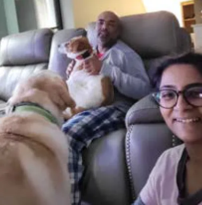 Chikki, a SAFI rescue dog from India, with their family in Boston, MA