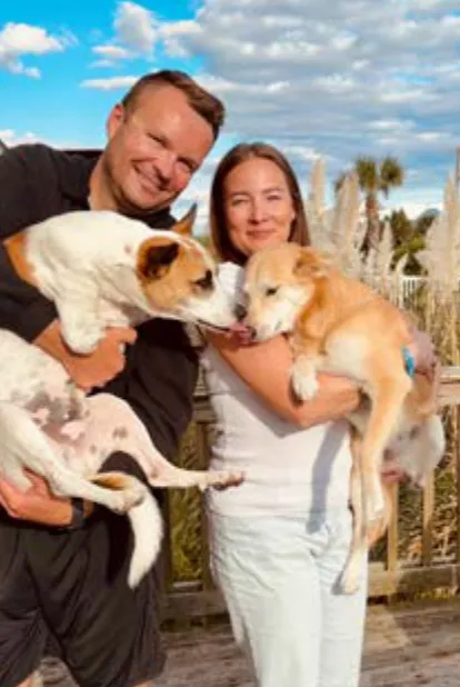 Cream, a SAFI rescue dog from India, with their family in North Carolina