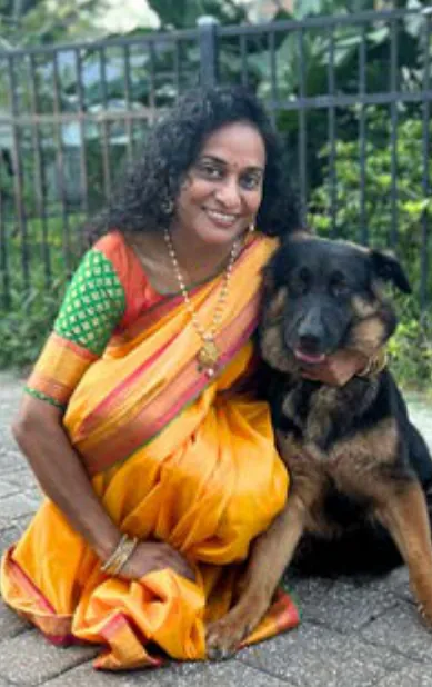 Kittu, a SAFI rescue dog from India, with their family in Florida