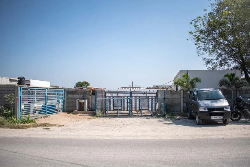 Rows of dog kennels at the SAFI shelter in Hyderabad